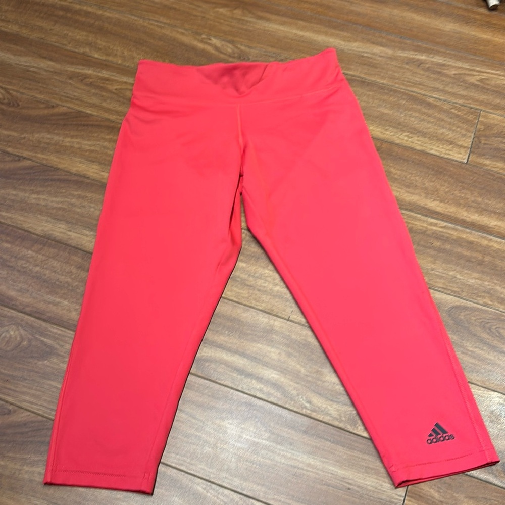Women’s Adidas 3/4 length athletic leggings. Size small, coral in color.